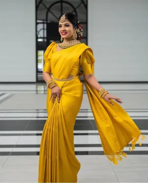 Engaging Yellow Soft Silk Saree with Ratatouille Blouse Piece